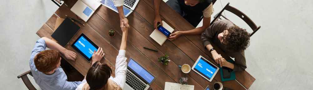 photo of people doing handshakes
